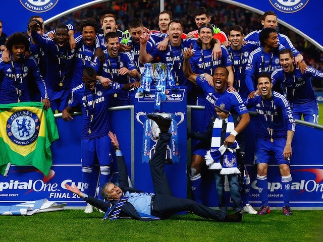Chelsea players and manager Jose Mourinho celebrate their victory in the Capital One Cup final at Wembley on March 1, 2015