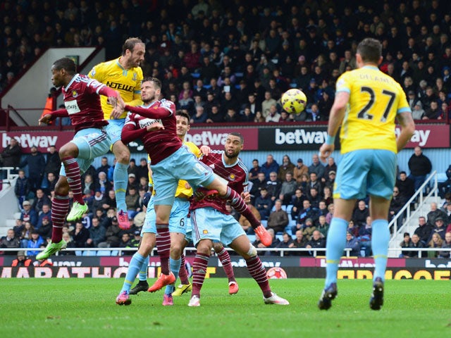 Glenn Murray of Crystal Palace scores their first goal with a header during the Barclays Premier League match between West Ham United and Crystal Palace at Boleyn Ground on February 28, 2015