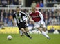  Dennis Bergkamp of Arsenal looks to go past Andy O''Brien (left) of Newcastle United during the FA Barclaycard Premiership match played at St James Park, in Newcastle on March 2, 2002