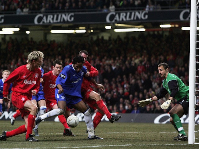 Didier Drogba of Chelsea scores in added time during the Carling Cup Final match between Chelsea and Liverpool at the Millennium Stadium on February 27, 2005 