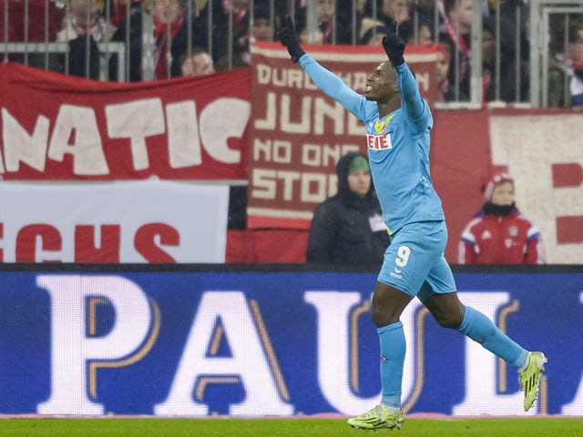 Anthony Ujah celebrates scoring the first goal for Koln during the German first division Bundesliga football match FC Bayern Munich vs 1 FC Koln in Munich, southern Germany, on February 27, 2015