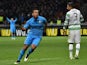 Inter Milan's midfielder from Colombia Fredy Guarin celebrates after scoring a goal during the UEFA Europa League football match Inter Milan vs Celtic FC on February 26, 2015 