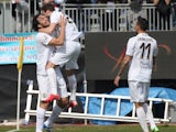Luca Toni of Verona celebrates with team-mates after scoring their first goal during the Serie A match between Cagliari Calcio and Hellas Verona FC at Stadio Sant'Elia on March 1, 2015
