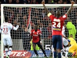 Lille's Senegalese midfielder Idrissa Gueye (C) celebrates after scoring a goal during the French L1 football match between Lille (LOSC) and Lyon (OL) on February 28, 2015