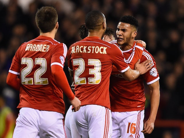 Jamaal Lascelles (r) of Nottingham Forest is congratulated on scoring the equalising goal during the Sky Bet Championship match against Bournemouth on February 25, 2015