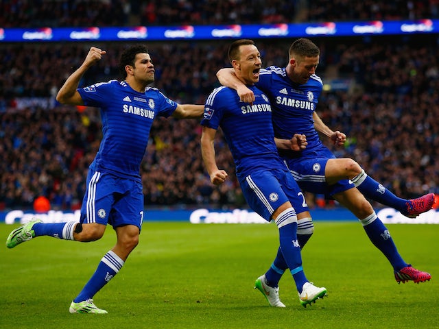 John Terry of Chelsea (C) celebrates scoring the opening goal with Diego Costa and Gary Cahill of Chelsea during the Capital One Cup Final match against Tottenham on March 1, 2015