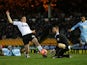 Jake Cole, Goalkeeper of Plymouth Argyle saves at the feet of Jordan Hugill of Port Vale during the Budweiser FA Cup third round match between Port Vale and Plymouth Argyle at Vale Park on January 5, 2014