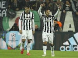 Carlos Tevez of Juventus FC celebrates after scoring the opening goal during the UEFA Champions League Round of 16 match between Juventus and Borussia Dortmund at Juventus Arena on February 24, 2015