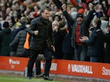 Liverpool's Northern Irish manager Brendan Rodgers celebrates at the final whistle in the English Premier League football match between Liverpool and Manchester City at Anfield stadium in Liverpool, north west England, on March 1, 2015