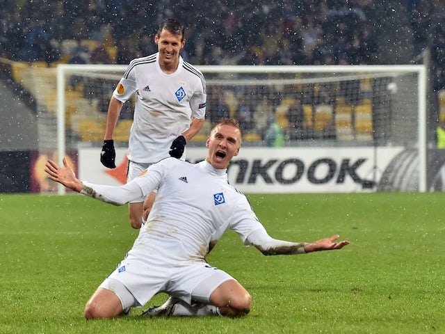 Lukasz Teodorczyk of Dynamo Kiev celebrates after scoring a goal during the UEFA Europa League, Round of 32 football match FC Dynamo Kiev vs Guingamp in Kiev on February 26, 2015