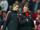 Manager Louis van Gaal of Manchester United speaks to Adnan Januzaj of Manchester United atr half time during the Barclays Premier League match between Manchester United and Sunderland at Old Trafford on February 28, 2015