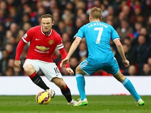Scholes defends under-fire Wayne Rooney