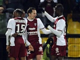 Metz' players celebrate after their French midfielder Bouna Sarr scored a goal during the French L1 football match between Metz (FCM) and Evian (ETGFC) on February 28, 2015