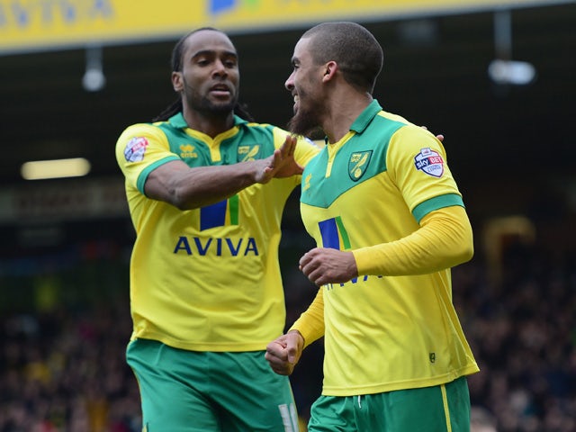 Lewis Grabban of Norwich City celebrates his goal during the Sky Bet Championship match between Norwich City and Ipswich Town at Carrow Road on March 1, 2015