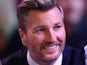 Football pundit Robbie Savage attends Day Eight of the William Hill PDC World Darts Championships at Alexandra Palace on December 28, 2014