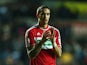 Seb Hines of Middlesbrough scorer of an own goal in his sides 0-1 defeat cuts a dejected figure as he applauds the travelling supporters during the Capital One Cup Quarter-Final match between Swansea City and Middlesbrough at the Liberty Stadium on Decemb