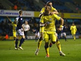 Lewis McGugan of Sheffield Wednesday celebrates his goal during the Sky Bet Championship match between Millwall and Sheffield Wednesday at The Den on February 24, 2015