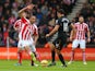 Steven N'Zonzi of Stoke City competes with Jake Livermore of Hull City during the Barclays Premier League match between Stoke City and Hull City at Britannia Stadium on February 28, 2015