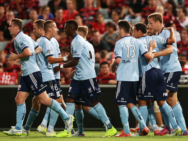 Marc Janko of Sydney FC celebrates with team mates after scoring a goal during the round 19 A-League match between the Western Sydney Wanderers and Sydney FC at Pirtek Stadium on February 28, 2015