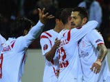 Vitolo of Sevilla (R) celebrates with team mates as he scores their second goal during the UEFA Europa League Round of 32 second leg match against Moenchengladbach on February 26, 2015