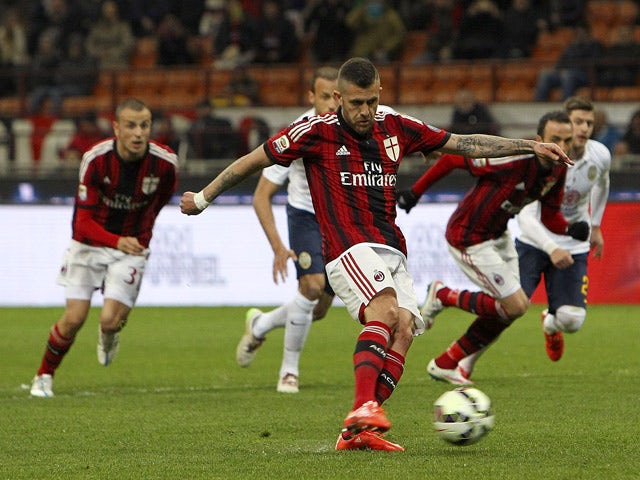 Jeremy Menez of AC Milan scores his goal from the penalty spot during the Serie A match between AC Milan and Hellas Verona FC at Stadio Giuseppe Meazza on March 7, 2015