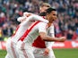 Anwar El-Ghazi of Ajax celebrates scoring the first goal of the game with Richairo Zivkovic and Daley Sinkgraven during the Dutch Eredivisie match between Ajax Amsterdam and SC Excelsior Rotterdam held at Amsterdam Arena on March 8, 2015
