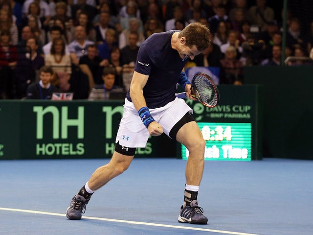  Andy Murray of The Aegon GB Davis Cup Team celebrates a point in his match against John Isner of the United States during Day 3 of the Davis Cup Match between GB and USA at Emirates Arena on March 8, 2015
