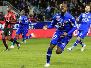 Bastia's Ivory Cost forward Giovanni Sio celebrates after scoring a goal during the French L1 football match Bastia (SCB) against Nice (OGCN) on March 7, 2015