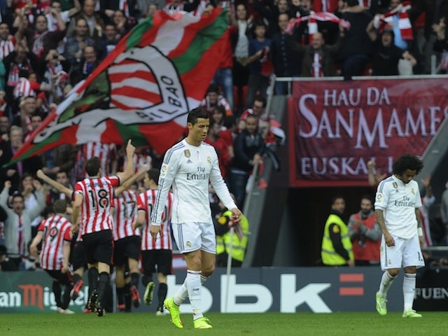 Real Madrid's Portuguese forward Cristiano Ronaldo (C) reacts after Athletic Bilbao scored during the Spanish league football match on March 7, 2015