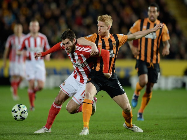 Danny Graham of Sunderland and Paul McShane of Hull City compete for the ball during the Barclays Premier League match on March 3, 2015