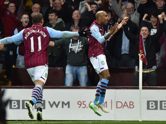Aston Villa midfielder Fabian Delph celebrates scoring the opening goal during the FA Cup quarter-final against West Bromwich Albion at Villa Park on March 7, 2015