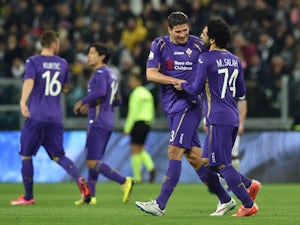 Mohamed Salah (R) of ACF Fiorentina celebrates the opening goal with team mate Mario Gomez during the TIM Cup match between Juventus FC and ACF Fiorentina at Juventus Arena on March 5, 2015