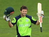 Ed Joyce of Ireland celebrates making his century during the 2015 ICC Cricket World Cup match between Zimbabwe and Ireland at Bellerive Oval on March 7, 2015