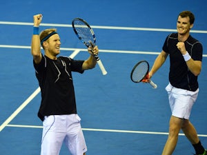 Jamie Murray and Dominic Inglot of the Aegon GB Davis Cup Team celebrate winning the fourth set against Mike Bryan and Bob Bryan of the United States during the doubles match on Day 2 of the Davis Cup match between GB and USA at the Emirates Arena on Marc