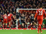 Jordan Henderson of Liverpool scores the opening goal during the Barclays Premier League match between Liverpool and Burnley at Anfield on March 4, 2015