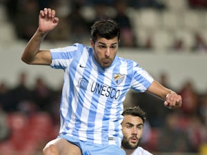 Miguel Torres signs new Malaga deal