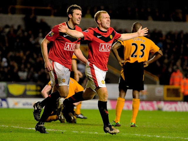 Paul Scholes of Manchester United celebrates his goal during the Barclays Premier League match between Wolverhampton Wanderers and Manchester United at Molineux on March 6, 2010 