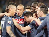 Napoli's Slovak forward Marek Hamsik (L) celebrates with teammates after scoring during the Italian Serie A football match SSC Napoli vs FC Internazionale Milano on March 08, 2015
