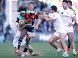 Marland Yarde of Quins is tackled by Tom Fowlie and James Short of Irish during the Aviva Premiership match between Harlequins and London Irish on March 7, 2015