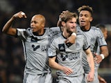 Marseille's French defender Baptiste Aloe celebrates with teammates after scoring a goal during the French L1 football match between Toulouse and Marseille in Toulouse, southwestern France, on March 6, 2015