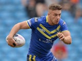 Matthew Russell of Warrington Wolves in action during the Super League match between Warrington Wolves and St Helens at Etihad Stadium on May 18, 2014