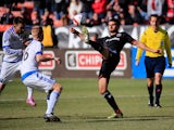 Perry Kitchen #23 of D.C. United passes the ball in front of Calum Mallace #16 of Montreal Impact during the first half at RFK Stadium on March 7, 2015