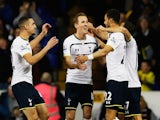 Nacer Chadli of Spurs (22) celebrates with team mates as he scores their first goal during the Barclays Premier League match against Swansea City on March 4, 2015