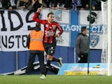 Nice's Brazilian midfielder Carlos De Olivera Alves celebrates after scoring a goal during a French L1 football match Bastia (SCB) against Nice (OGCN) at the Armand Cesari stadium in Bastia on March 7, 2015