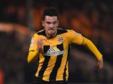 Ryan Donaldson of Cambridge United runs with the ball during the FA Cup Fourth Round match between Cambridge United and Manchester United at The R Costings Abbey Stadium on January 23, 2015