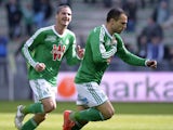 Saint-Etienne French midfielder Yohan Mollo celebrates after scoring a goal during the French L1 football match between Saint-Etienne (ASSE) and Lorient (FCL) on March 8, 2015