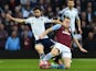 Aston Villa's English midfielder Tom Cleverley (R) vies with West Bromwich Albion's Argentinian midfielder Claudio Yacob during the FA Cup quarter-final match  on March 7, 2015