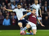 Aston Villa's English midfielder Tom Cleverley (R) vies with West Bromwich Albion's Argentinian midfielder Claudio Yacob during the FA Cup quarter-final match  on March 7, 2015