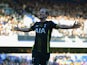 Harry Kane of Spurs celebrates as he scores their second goal during the Barclays Premier League match between Queens Park Rangers and Tottenham Hotspur at Loftus Road on March 7, 2015