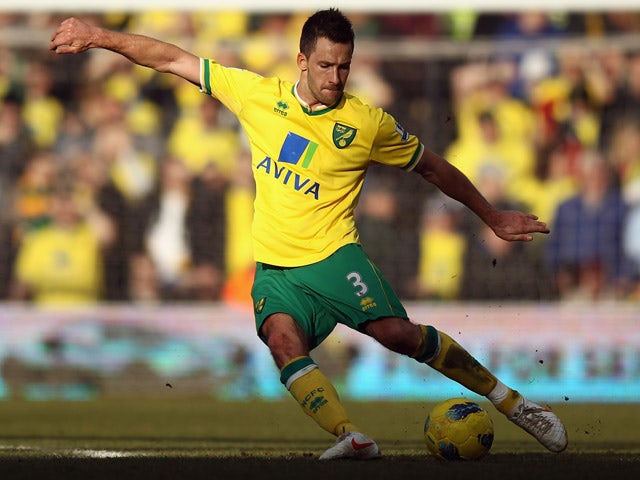 Adam Drury of Norwich City in action during the Barclays Premier League match between Norwich City and Manchester United at Carrow Road on February 26, 2012